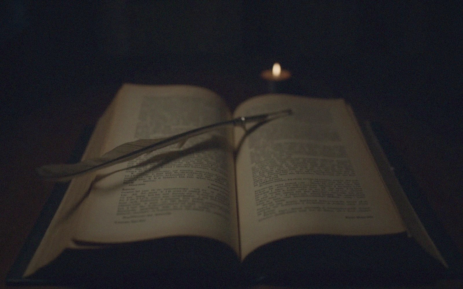 Candlelit still life evoking what the film draws from Dumas